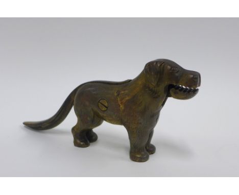 An early 20th century novelty nut cracker in the form of a Dog22cm long 