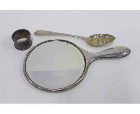 Georgian Scottish silver berry spoon, Edinburgh 1802, a silver backed hand mirror and an Edwardian London silver napkin ring 