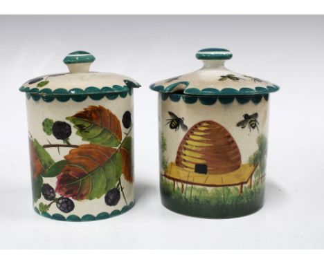 Wemyss Ware, two preserve jars with covers, pattern include bee skep and blackberries, painted marks, (2) 11 x 13cm. 