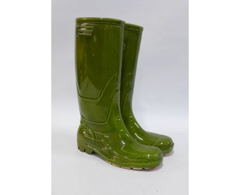 Green glazed pottery Wellington boots planter / vase, 19 x 35cm. 