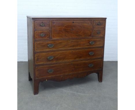 Georgian mahogany and string inlaid secretaire chest, rectangular top with moulded edge over a fall front which opens to a fi