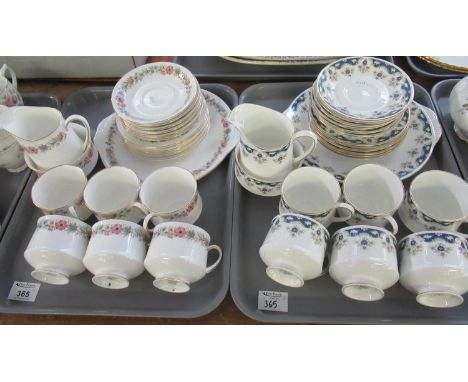 Two trays of part teaware: one tray of Paragon fine bone china 'Belinda' pattern with cornflowers to include: six cups and sa