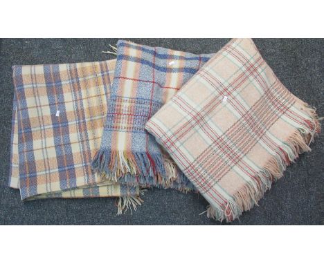 Three vintage woollen blankets or carthen in check design. (3)(B.P. 21% + VAT) 
