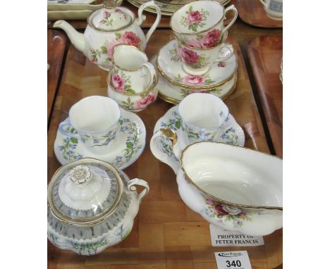 Tray of assorted fine bone china to include: two Shelley 'Harebell' coffee cups and saucers, a Royal Albert 'American Beauty'