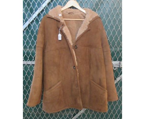 A vintage sheepskin jacket. (B.P. 21% + VAT) Overall good condition. Some spot stains and small stain to the back. Label sugg