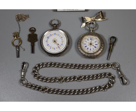 Silver engraved key wind fancy fob watch with ceramic Roman face and bow suspension, together with another similar fob watch 