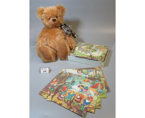 Robin Rive teddy bear, together with a Snow White and the Seven Dwarves vintage block puzzle.(B.P. 21% + VAT) 