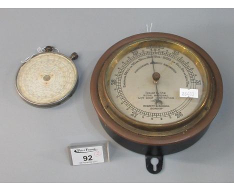 Fowler's Universal Calculator in circular form with printed dial and plated case. Together with a fisherman's aneroid baromet