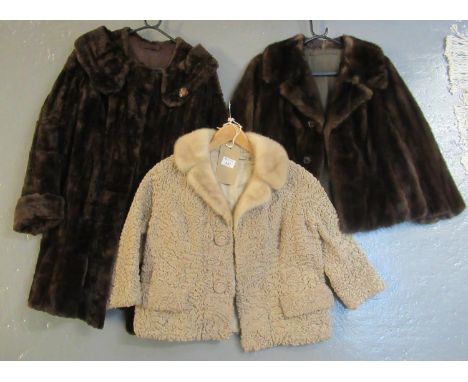 Three vintage fur items to include; a blonde astrakhan jacket with mink fur collar, a mink fur jacket and a mole fur swing co