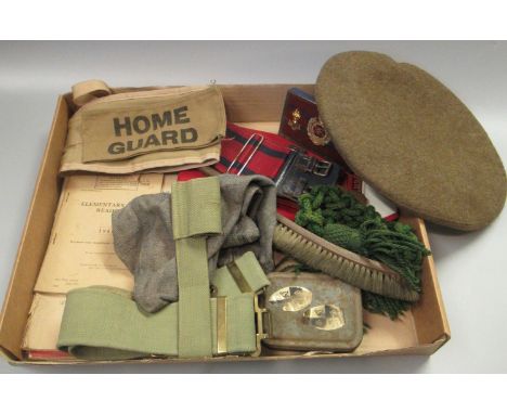 Box of military uniform items; buckles, belts, webbing, beret dated 1945 etc. Also including ephemera to include; 'Elementary