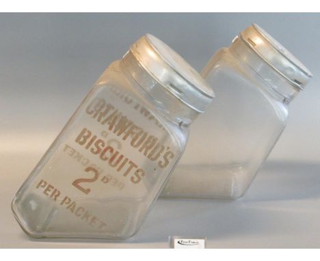 Two vintage glass biscuit lidded jars, one marked 'Crawford's Biscuits' 2D per packet. (2)(B.P. 21% + VAT) 