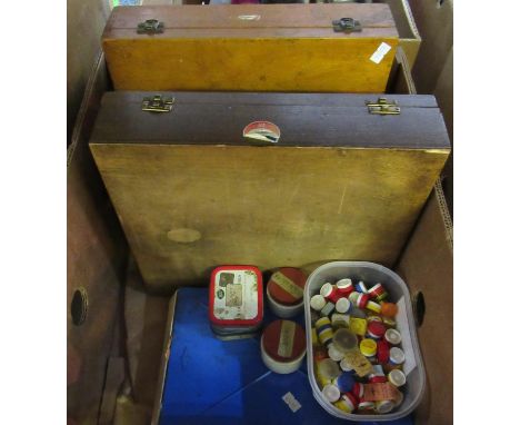 Watch repairer's box containing: three wooden boxes of unbreakable watch glasses, two further boxes of watch and clock parts,
