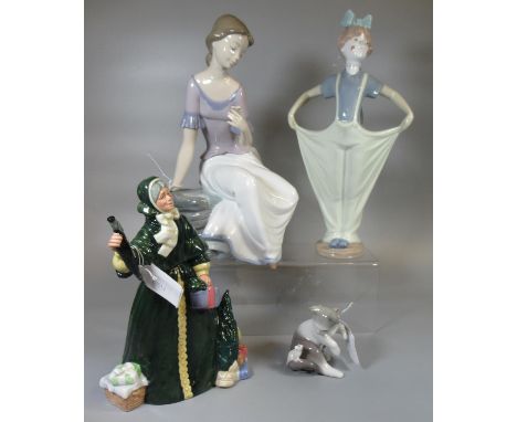 Royal Doulton fine bone china figurine 'Christmas Parcels' HN2851, together with Lladro porcelain study of a cat and mouse an