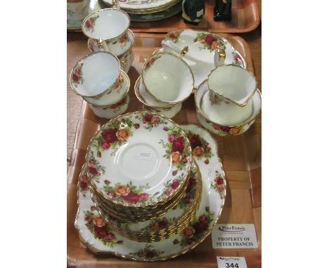 A tray of Royal Albert 'Old Country Roses' to include: six coffee cups with eight saucers, six tea plates, sandwich plate, mi