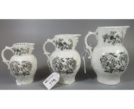 A set of three Royal Worcester porcelain graduated bicentenary 1951 porcelain jugs with mask head spout. (3)(B.P. 21% + VAT) 