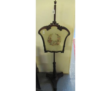 Victorian mahogany pole/makeup screen with floral tapestry panel.(B.P. 21% + VAT) 