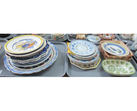 Four trays of assorted Quimper ware French pottery  items in various designs to include; bowls with handles, cups, lidded bow