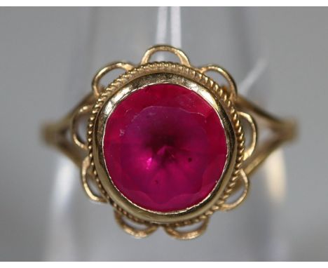 9ct gold ruby ring. Ring size L. Approx weight 2.7 grams. (B.P. 21% + VAT)  Dimensions - 8mm Approx 