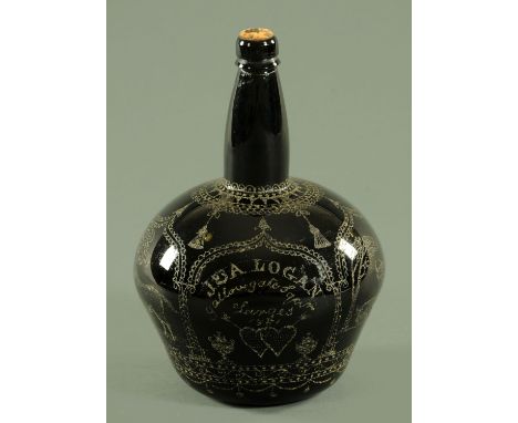 A 19th century glass club shaped bottle, etched to commemorate a marriage, J & A Logan, Gallowgate 1851.  Height 29 cm. CONDI