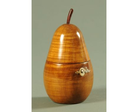 A turned fruitwood pear shaped tea caddy.  Height 15.5 cm.