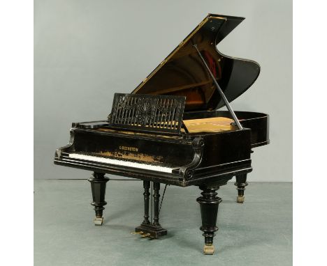 A Bechstein grand piano, the frame numbered 43520, the ebonised case supported on turned legs with metal castors, circa 1887-