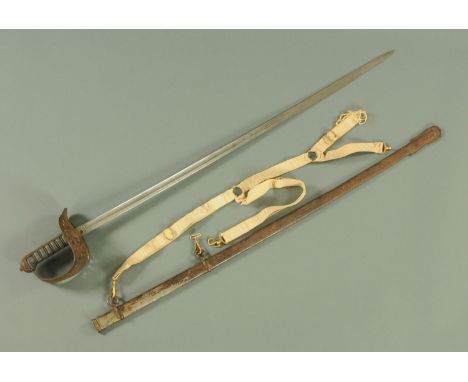 A Victorian army officers dress sword, with part fullered engraved blade, with wire bound shark skin grip, with steel scabbar