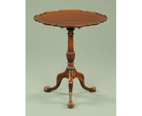 An Edwardian mahogany tripod table, with Chippendale border and snap action, with turned and lobed column and raised on three