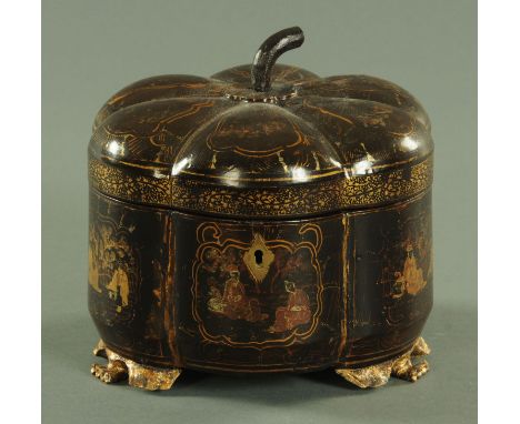 An early 19th century chinoiserie lacquered tea caddy, pumpkin shape, with lead interior canister and raised on bracket feet.