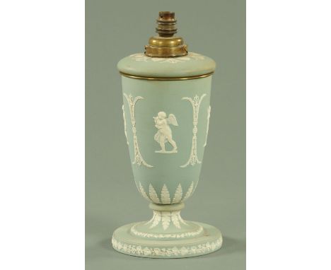 A Jasperware oil lamp base, late 19th century, in sage green ground with applied cherub and stiff leaf decoration, converted 