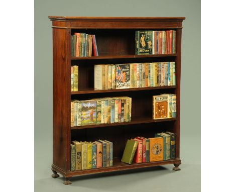 An Edwardian mahogany open bookcase, with moulded cornice above a series of adjustable shelves and all raised on shaped brack