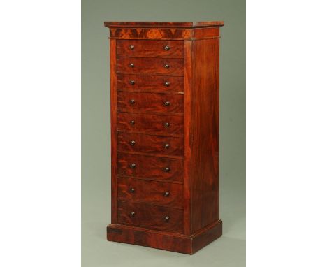 A Victorian mahogany Wellington chest, with caddy top above nine graduated drawers raised on a plinth, width 66 cm, height 15