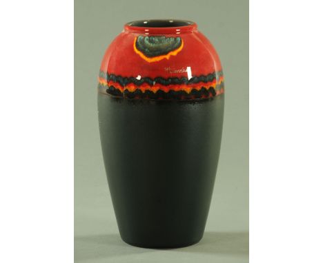 A Poole pottery "Millennium" collection Egyptian vase, designed by Alan Clark with certificate, limited edition number 1749 o