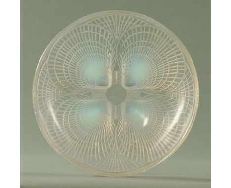 A Lalique Coquilles bowl, opalescent etched R Lalique France to the underside.  Diameter 23.7 cm (see illustration). CONDITIO