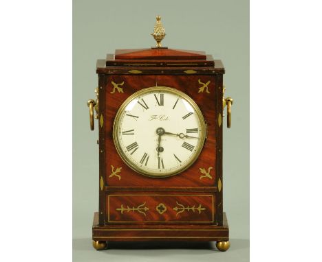 A Regency mahogany single fusee bracket clock, with pineapple finial, the dial marked Cole London, the case raised on four br
