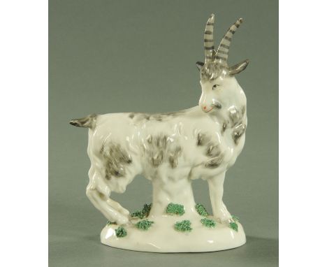 A Samson of Paris porcelain figure of a goat, late 19th century, standing with its head turned to the right upon a mossy patc