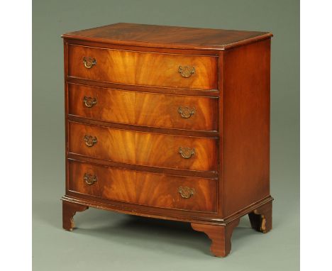 A mahogany bow front chest of five drawers, mid 20th century, with applied label verso for "Reprodux", upon shaped bracket fe