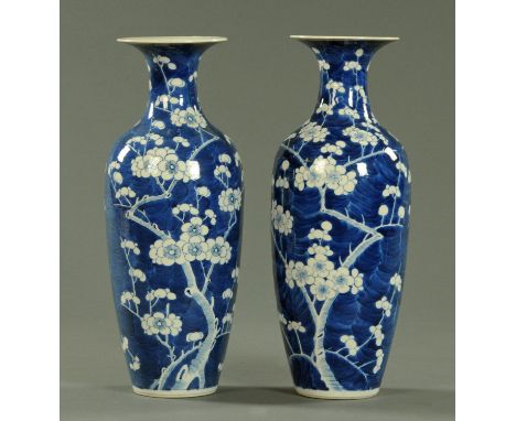 A pair of Chinese blue and white blossoming prunus pattern vases, late 19th century, with four character pseudo Kangxi mark, 