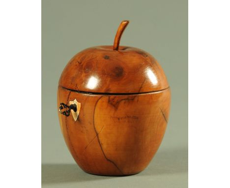 A George III style fruitwood tea caddy, in the form of an apple, initialled to the underside "FH".  Height 14.5 cm. 