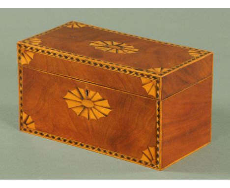 A George III inlaid mahogany tea caddy, circa 1790, with two interior caskets with sliding tops and aperture for a bowl.  Wid