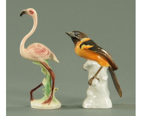 A Herend Rothschild model of a bird, 20th century, supported on a white rocky mount, print, impressed and inscribed "Roth", a