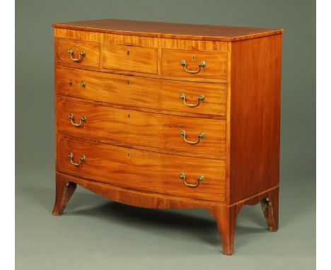 A late Georgian mahogany bowfronted chest of drawers, crossbanded and fitted with three short and three long graduated drawer