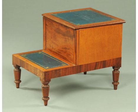 A 19th century mahogany step commode, with inset leather top and step and supported upon turned legs, 42.5 cm wide, 46 cm hig