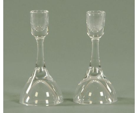 Vicke Lindstrand for Kosta, a pair of glass candlesticks, 20th century, with plain sconce on a slender stem leading to a dome