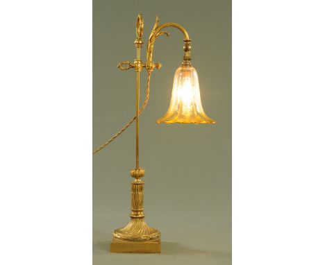 An Edwardian brass adjustable table lamp, with amber and clear glass shade.  Height 58 cm (see illustration). CONDITION REPOR