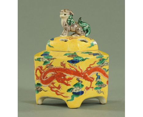 A Japanese Kutani Koro, Meiji period, with Shi Shi finial on a pierced lozenge cover, the body decorated with a dragon amongs