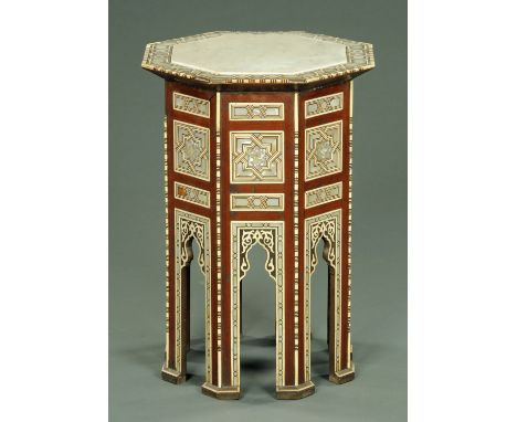 Two octagonal Eastern bone and inlaid mother of pearl occasional tables.  Widest 48 cm, tallest 62 cm.  CONDITION REPORT: The