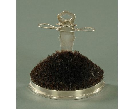 A silver demi lune nib wipe, William Comyns and Sons, London 1913, having a pierced central strut with three apertures for pe