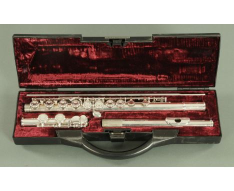 A Buffet "crampon" cooper scale plated flute, within a plush fitted buffet case.