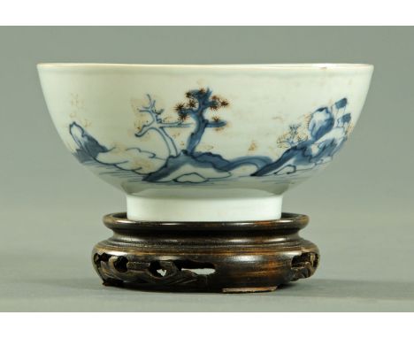 A Nanking Cargo blue and white bowl, circa 1752, with traces of enamelled decoration, with Christie's label to the base.   Di