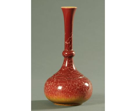 A Linthorpe pottery vase, 19th century, having a slightly flaring rim and knopped neck above the onion shape body with crackl